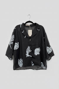 Conjunto café y negro con estampado