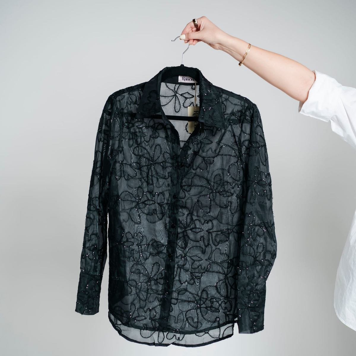Blusa garigoles brillo