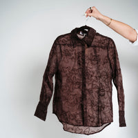 Blusa garigoles brillo