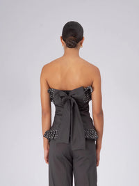 Top strapless de lunares blancos