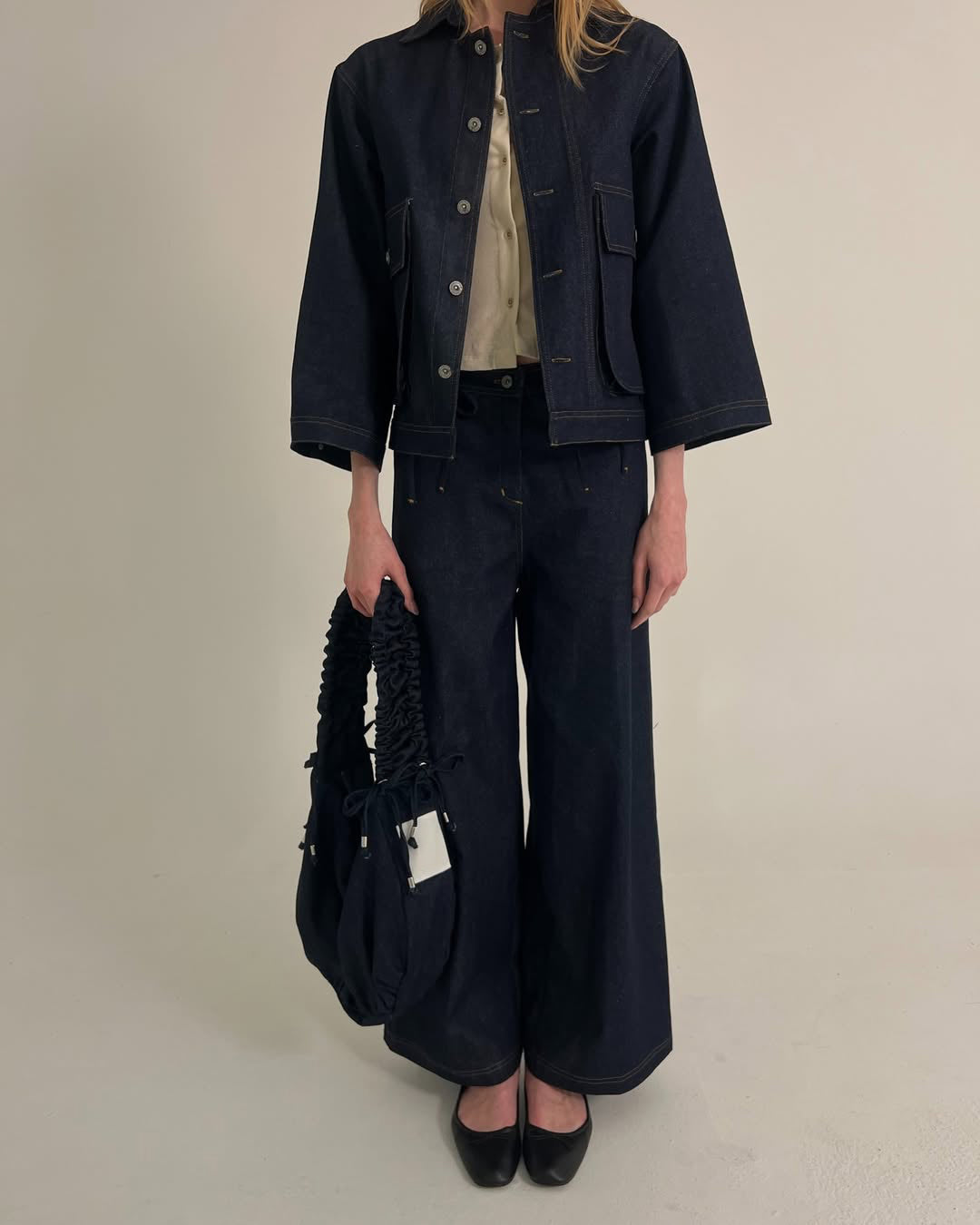 Jeans mezclilla oscura moños