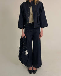 Jeans mezclilla oscura moños